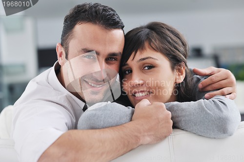 Image of happy young couple relax at home