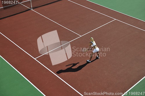 Image of young woman play tennis 