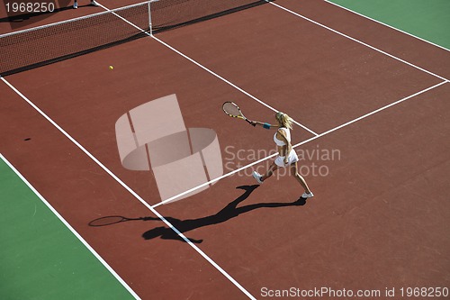 Image of young woman play tennis 
