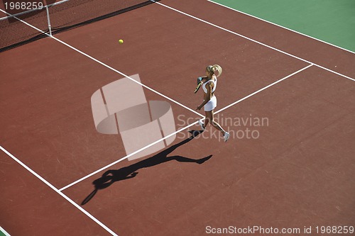 Image of young woman play tennis 