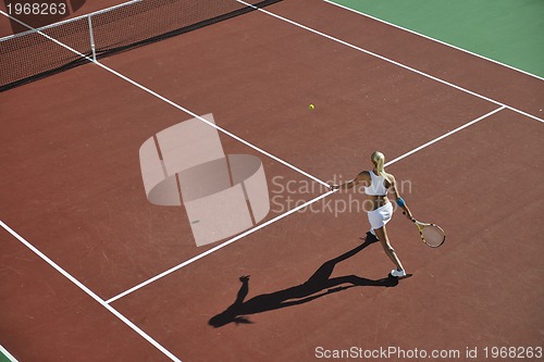 Image of young woman play tennis 