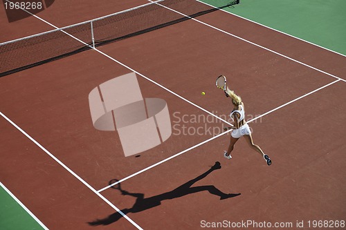 Image of young woman play tennis 