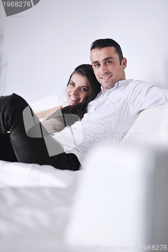 Image of happy young couple relax at home