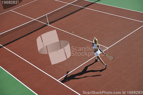 Image of young woman play tennis 