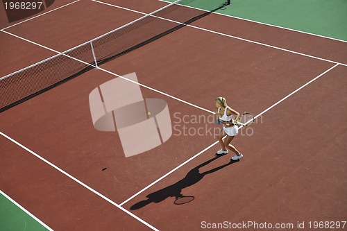 Image of young woman play tennis 