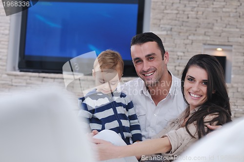 Image of happy young family have fun  at home