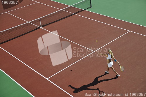 Image of young woman play tennis 