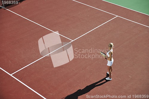 Image of young woman play tennis 