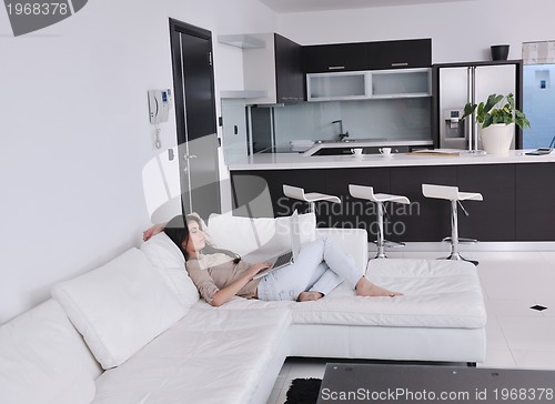 Image of woman work on laptop at home