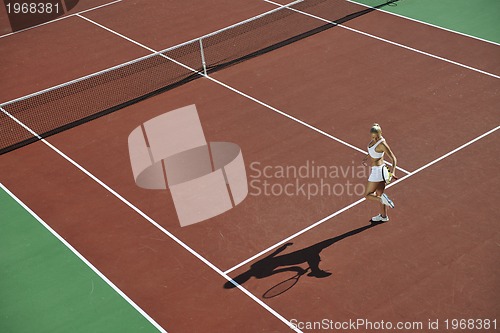 Image of young woman play tennis 
