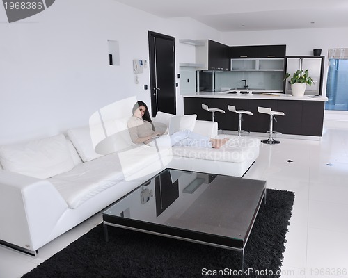 Image of woman work on laptop at home