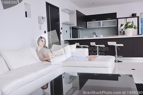 Image of woman work on laptop at home