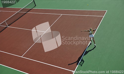 Image of young woman play tennis 