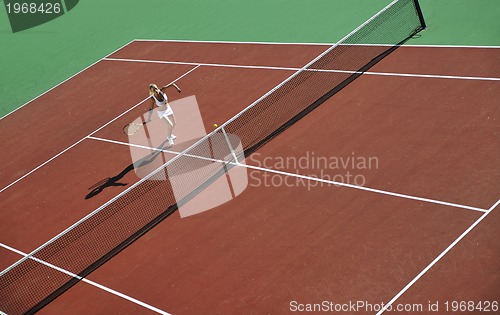 Image of young woman play tennis 