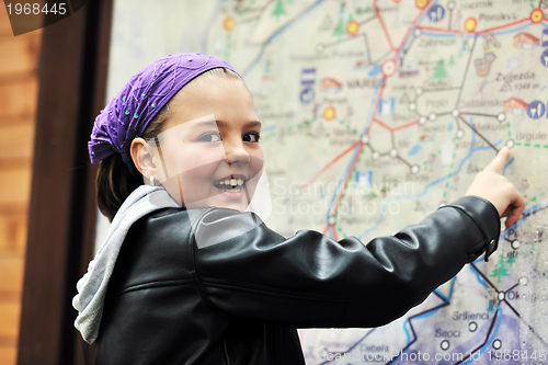 Image of girl with city map panel