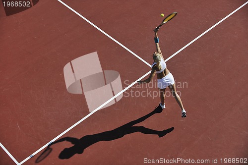 Image of young woman play tennis 