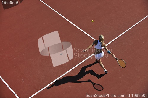Image of young woman play tennis 