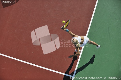 Image of young woman play tennis 