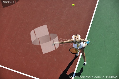 Image of young woman play tennis 