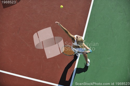 Image of young woman play tennis 