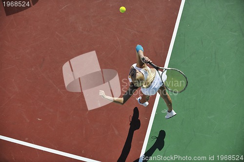Image of young woman play tennis 