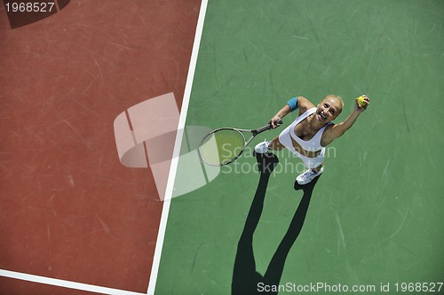 Image of young woman play tennis 