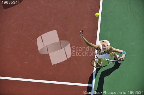 Image of young woman play tennis 