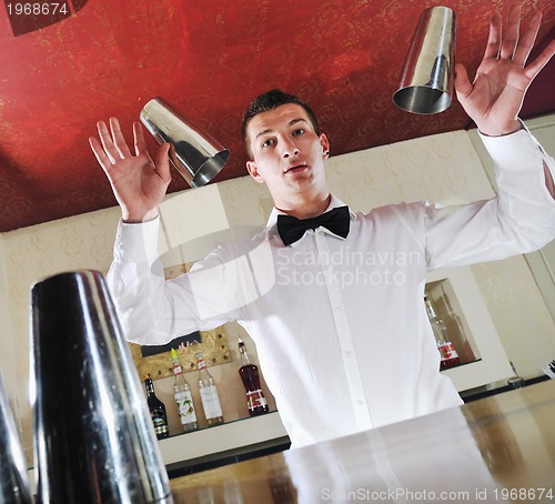 Image of pro barman prepare coctail drink on party