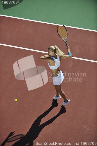 Image of young woman play tennis 