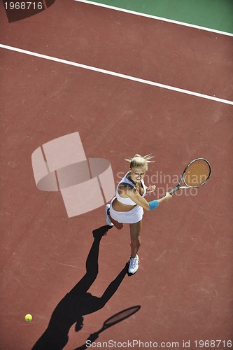 Image of young woman play tennis 