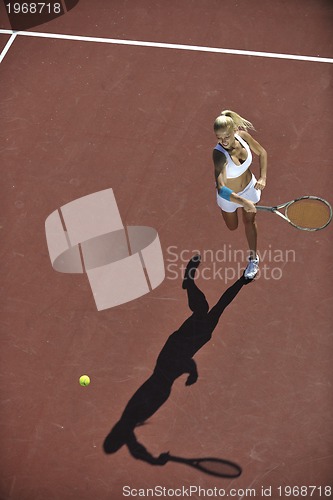 Image of young woman play tennis 