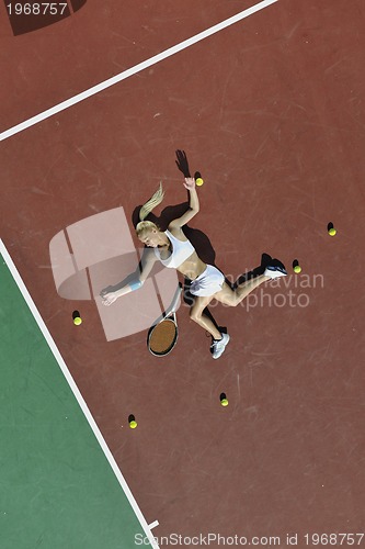 Image of young woman play tennis 