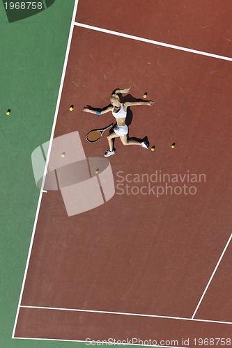 Image of young woman play tennis 