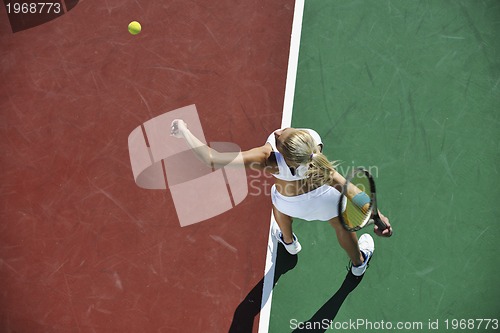 Image of young woman play tennis 