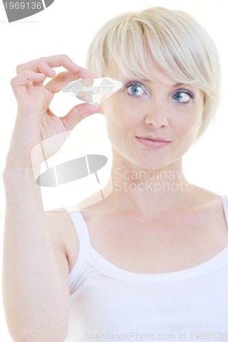 Image of Beautiful blonde woman hold diamond