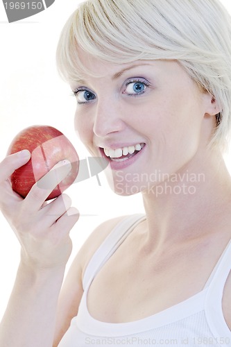 Image of happy  young  woman eat green apple isolated  on white