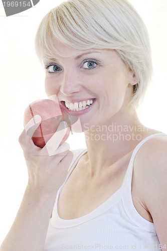 Image of happy  young  woman eat green apple isolated  on white