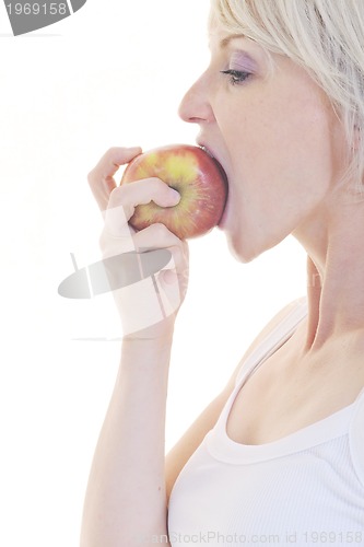 Image of happy  young  woman eat apple isolated  on white