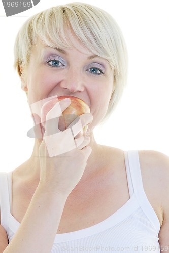Image of happy  young  woman eat green apple isolated  on white