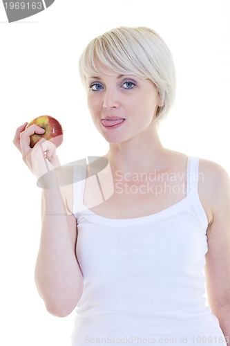 Image of happy  young  woman eat green apple isolated  on white