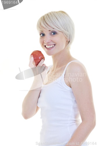 Image of happy  young  woman eat green apple isolated  on white