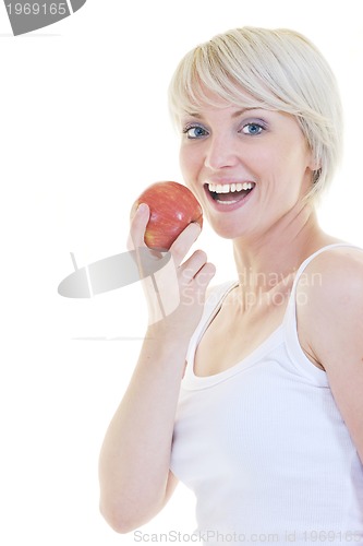 Image of happy  young  woman eat green apple isolated  on white