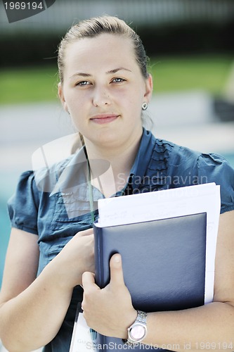 Image of young business woman outdoor