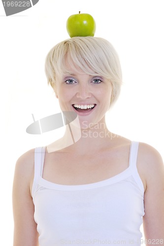 Image of happy  young  woman eat green apple isolated  on white