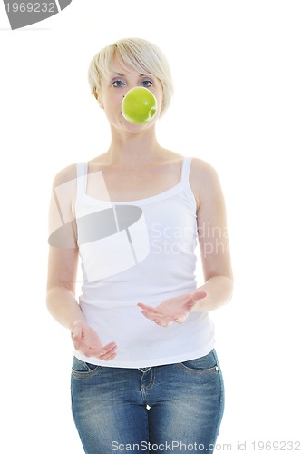 Image of happy  young  woman eat green apple isolated  on white