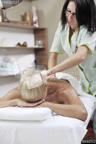 Image of woman back massage treatment