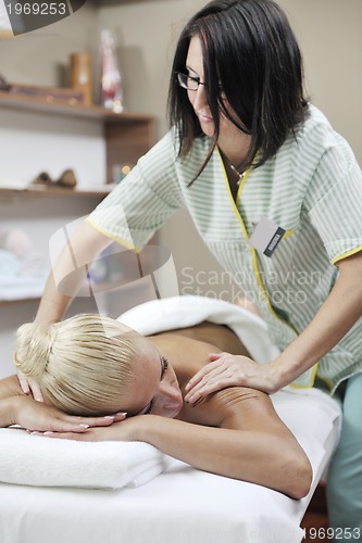 Image of woman back massage treatment