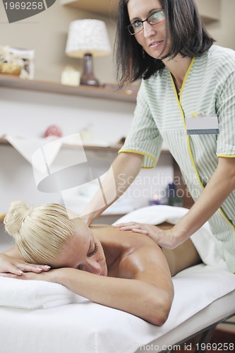 Image of woman back massage treatment