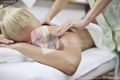 Image of woman back massage treatment