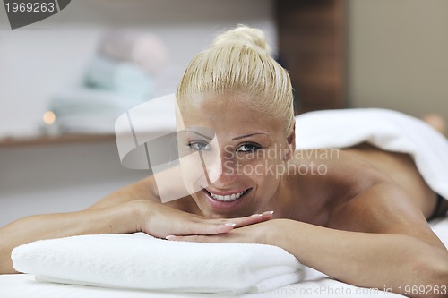 Image of woman at spa and wellness back massage